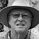 Jim Farley als Tennyson