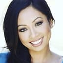 Kimberly Cheng als TV Newscaster