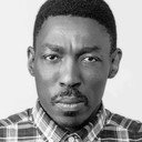 Ronnie Nyakale als Zakes Mbolelo