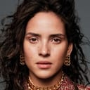 Adria Arjona als Bix Caleen (archive footage) (uncredited)