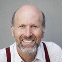 Bruce A. Woolley als Dr. Arron