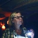 Pam Waldman als Paranormal Investigator