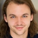 Nathan Stevens als Elisha Flagg