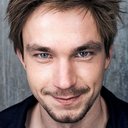 Александр Петров als Artem Isayev, Jr.