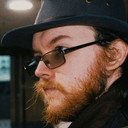 Mikie Holmes als Camera Shop Employee