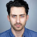 Andy Bean als Romit