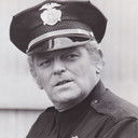 Eddie Egan als Simonson