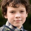 Harry Webster als John Tolkien Jnr. (Child)
