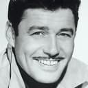 Guy Williams als Dick Cosgrove (uncredited)