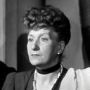 Germaine Stainval als The Boss of the Café (uncredited)