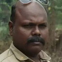 Milind Shinde als Ashok Mali