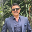 Arjun Shrestha als Mahendra Shah