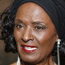 Maria das Graças als Santa