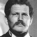 René Sánchez als El Cura