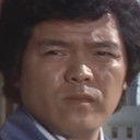 Sueto Tsukada als Crimson's accomplice