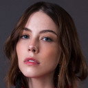 Bia Arantes als Teodora Moura