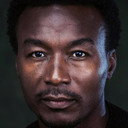 Brian Angels als Sergeant Asare