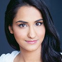 Amrit Kaur als Bela Malhotra