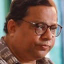 Ashim Roy Chowdhury als Ashu Chakrabarty