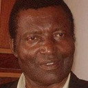Alphonse Beni als Inspecteur Baïko
