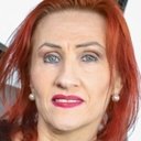 Emily Devine als Survivor Interviewee #1