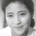 Hyeon-Sook Kim als Eun-sil, Yong-cheol's wife