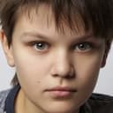 Grigory Sereda als Boy in Yard