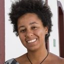 Glenda Nicácio, Assistant Director