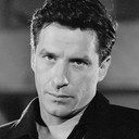 John Cassavetes als Robert Harmon (archive footage) (uncredited)