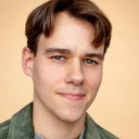 Brandon Johnston als Elf Photo Clerk