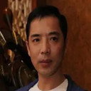 Mu Li-Xin als E Yu