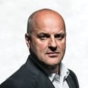 Christopher Purves als Reg / Bigus Dickus - Bass