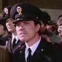 Armando Tortorici als Police Officer (uncredited)