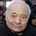 Burt Young als George