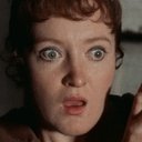Patsy Rowlands als Miss Dempsey
