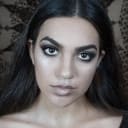 Sama Fernands als Receptionist / Hairdresser / Wrestling Spectator (as Samantha Fernands)