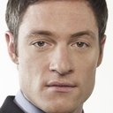 Tahmoh Penikett als Emerson