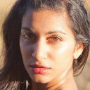 Devi als Self (archive footage)