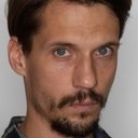Piotr Zajączkowski als SB Officer