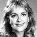 Deborah Harmon als TV Newscaster (uncredited)