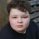 Ara Hollyday als Young John Johanson