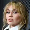 Miley Cyrus als Mainframe (voice) (uncredited)