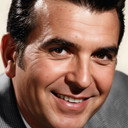 Dennis James als Wrestling commentator 1