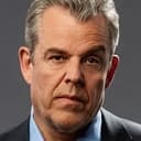 Danny Huston als Sandy Woodrow