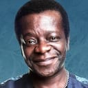 Stephen K. Amos als Conductor