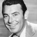 George Brent als Curt Devlin