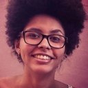 Yasmin Thayná, Director