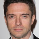 Topher Grace als Elder Kennedy