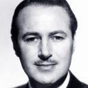 Hugh French als George Van Basingwell