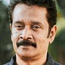 Elango Kumaravel als Kumbakarai 'Kumki' Krishnamurthy